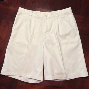 Tan Under Armour Golf Shorts.